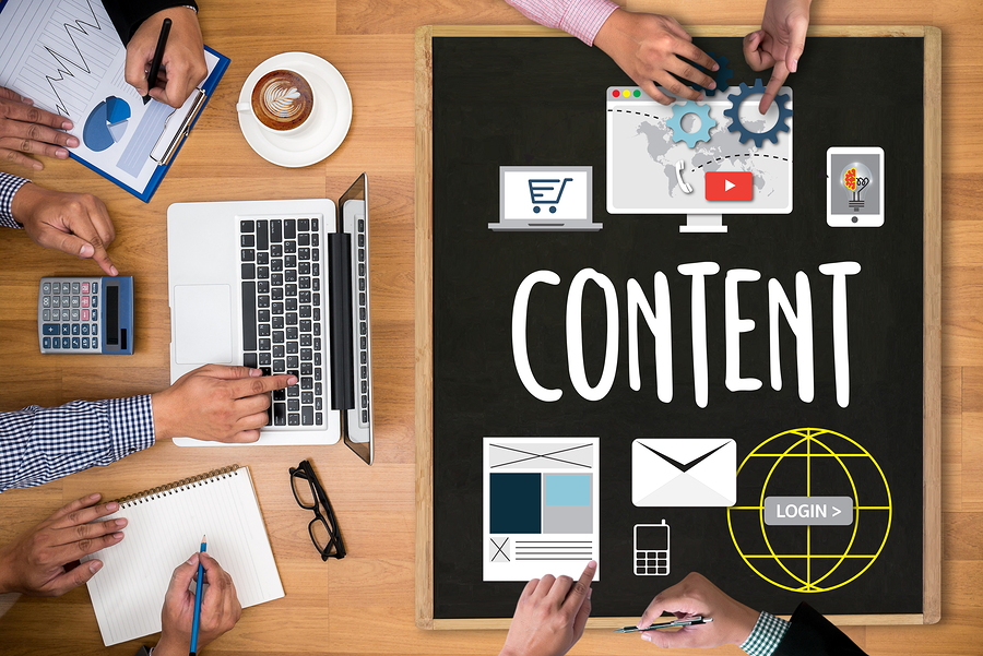 Content marketers creating new content on website and emails.